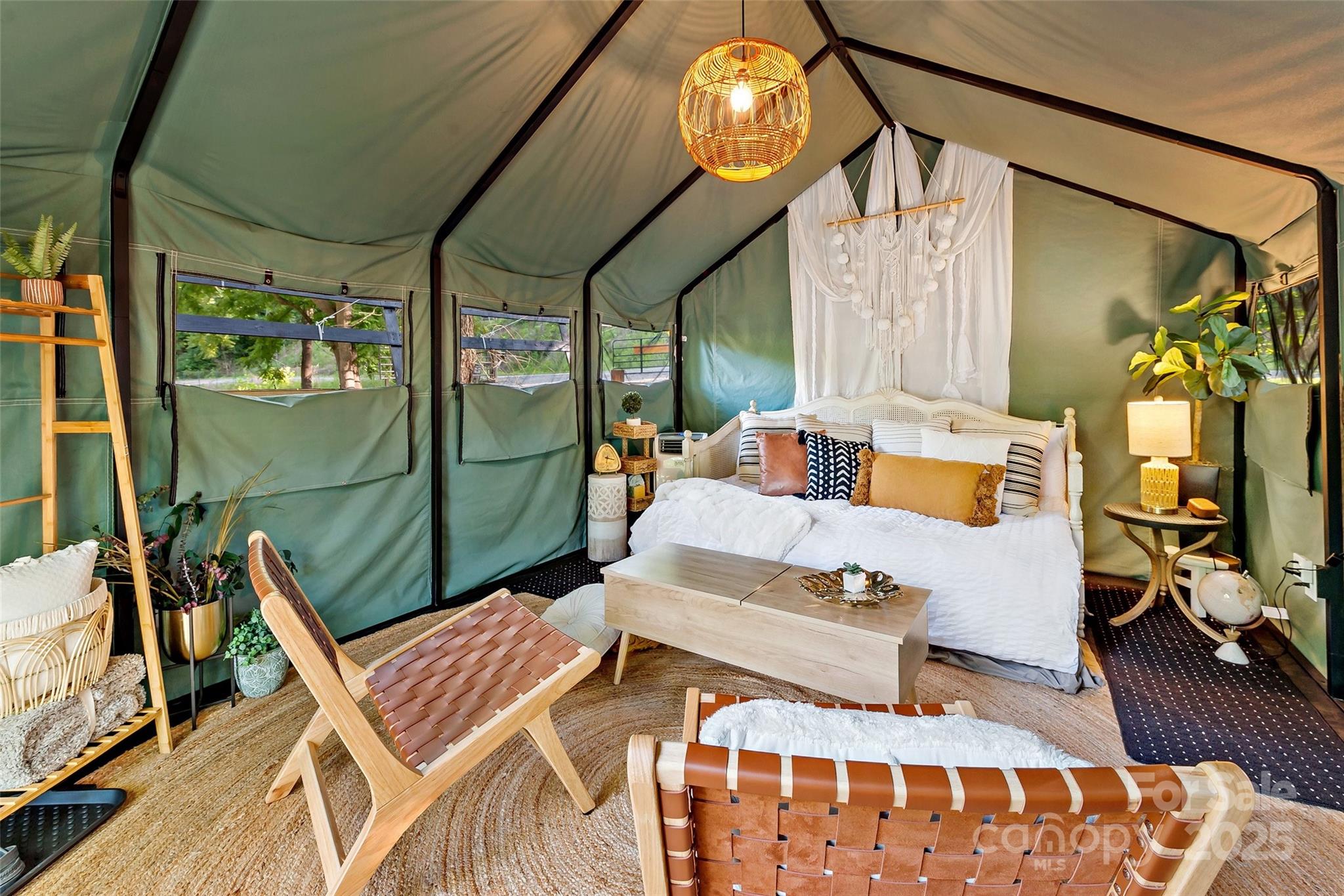 43 Polly Spout Road Marion, NC 28752 - Photo 13 of 34 a bedroom with furniture and a window