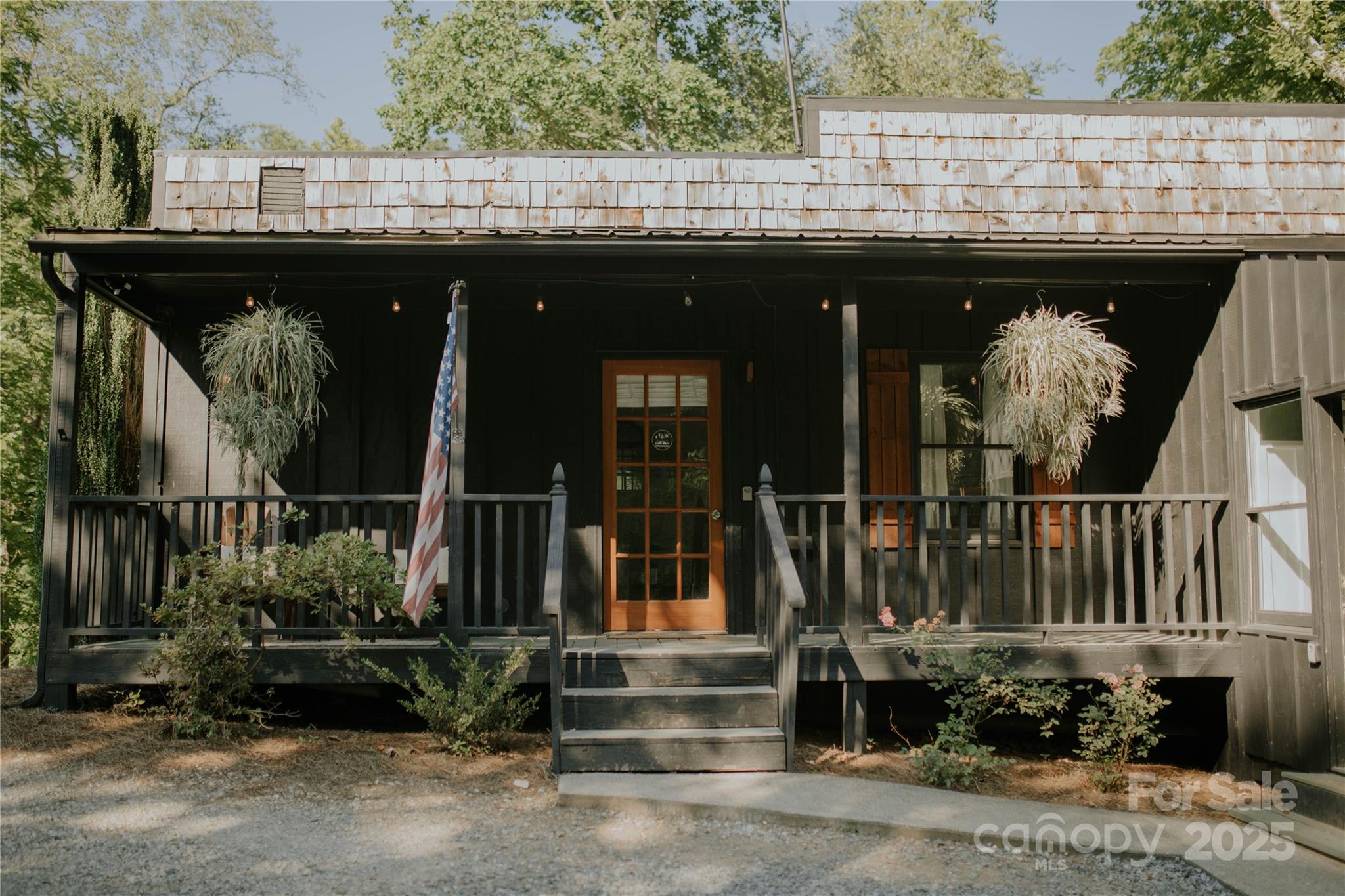 43 Polly Spout Road Marion, NC 28752 - Photo 3 of 34 a front view of a house with a porch