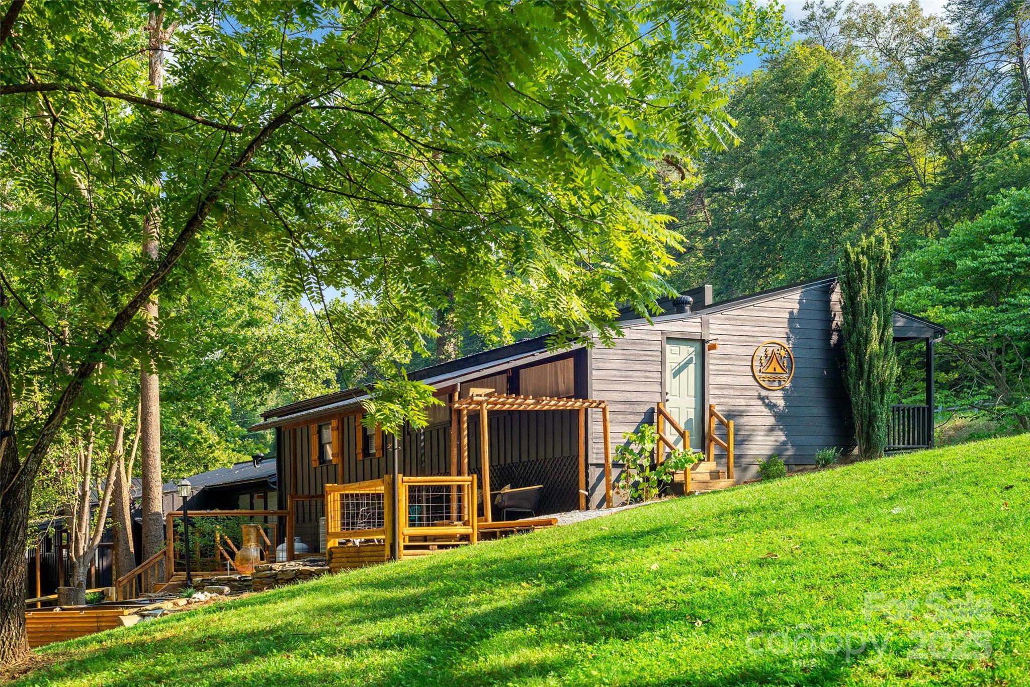 43 Polly Spout Road Marion, NC 28752 - Photo 6 of 34 front view of a house with a yard