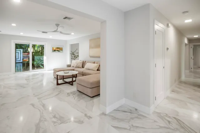 a kitchen with stainless steel appliances granite countertop a stove and a sink
