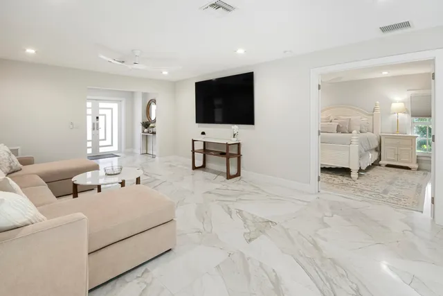 a view of a hallway with front door