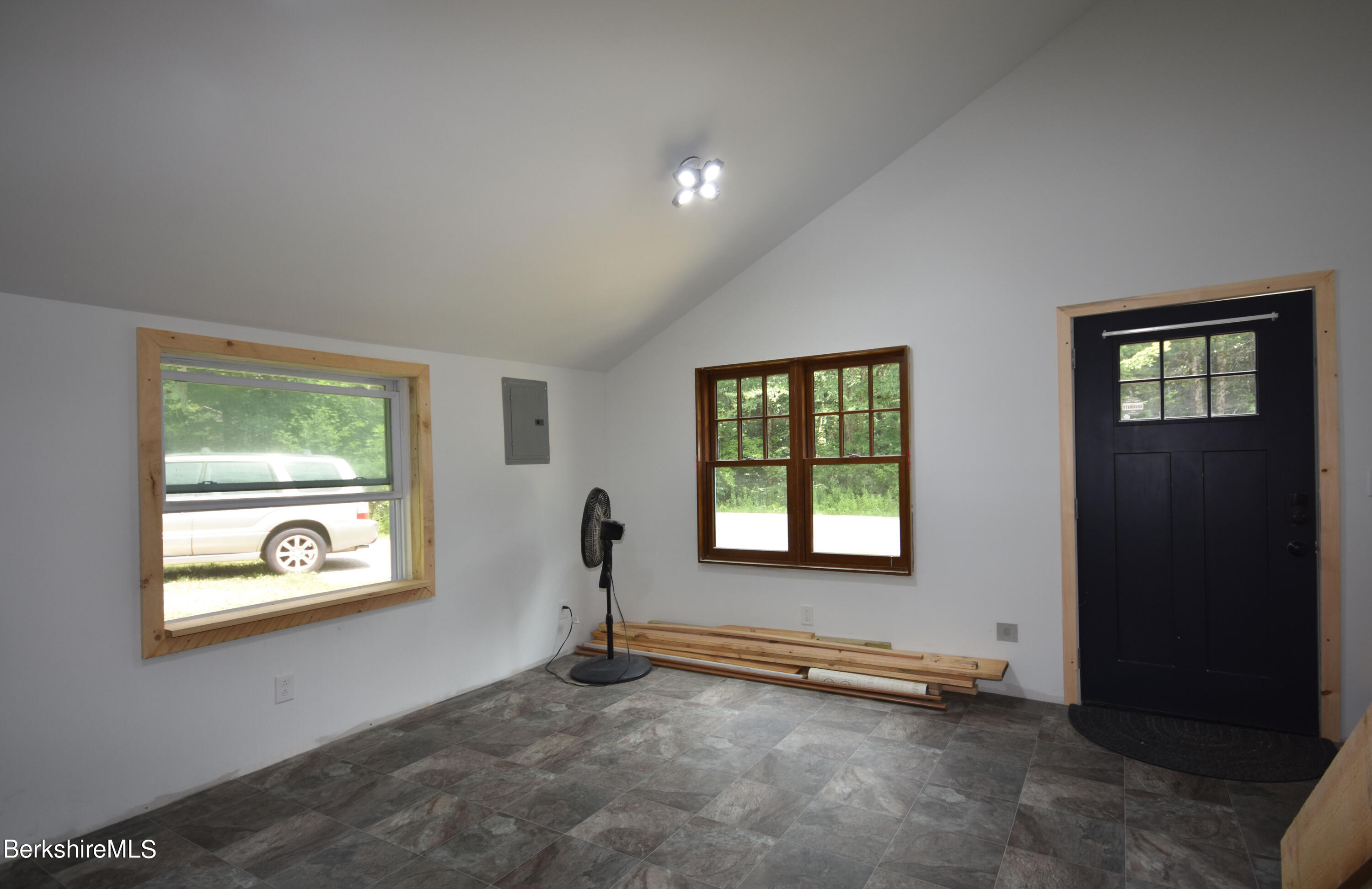 523 Center Road Savoy, MA 01256 - Photo 11 of 31 a view of a livingroom with furniture wooden floor and windows