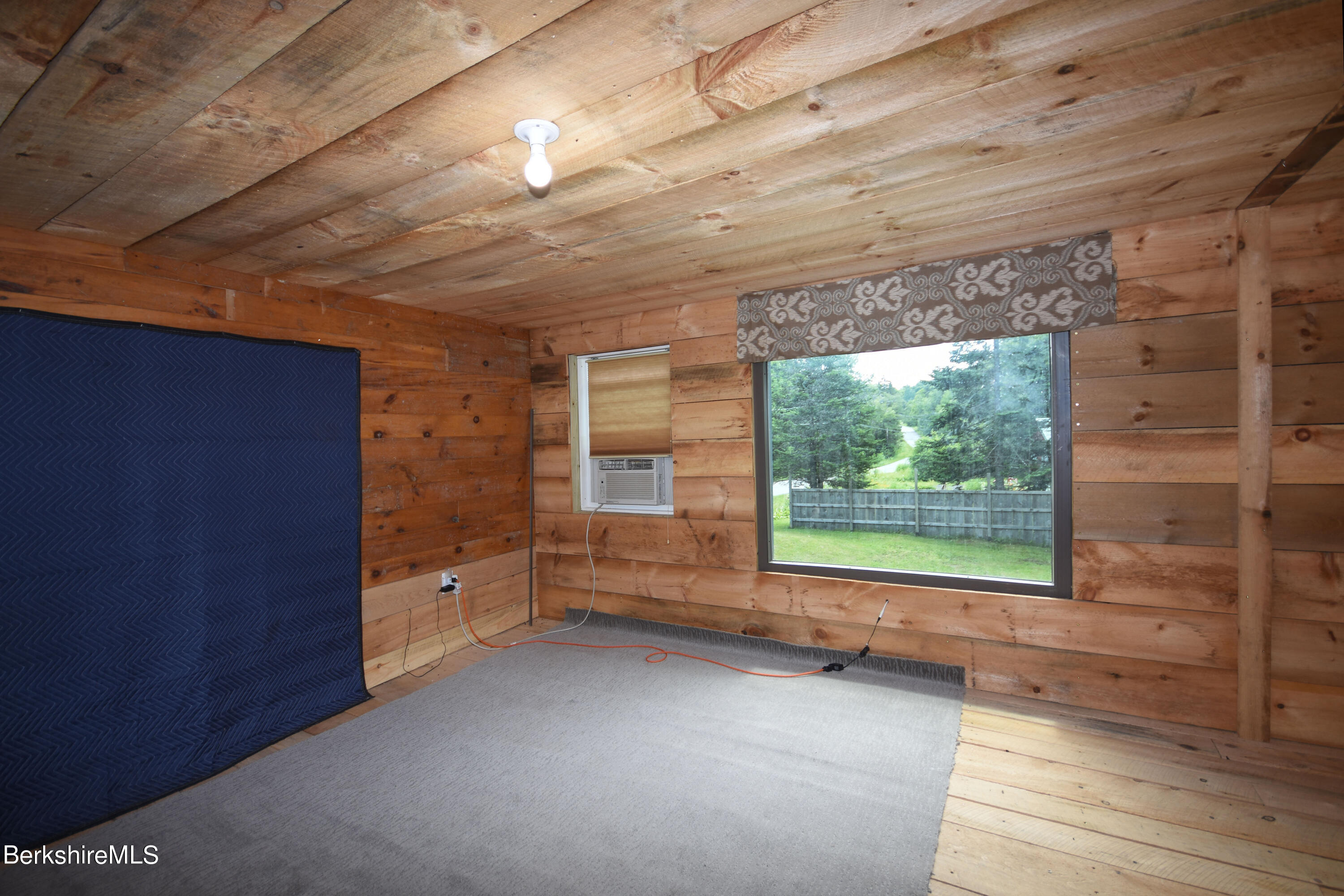 523 Center Road Savoy, MA 01256 - Photo 17 of 31 a view of an empty room with a window