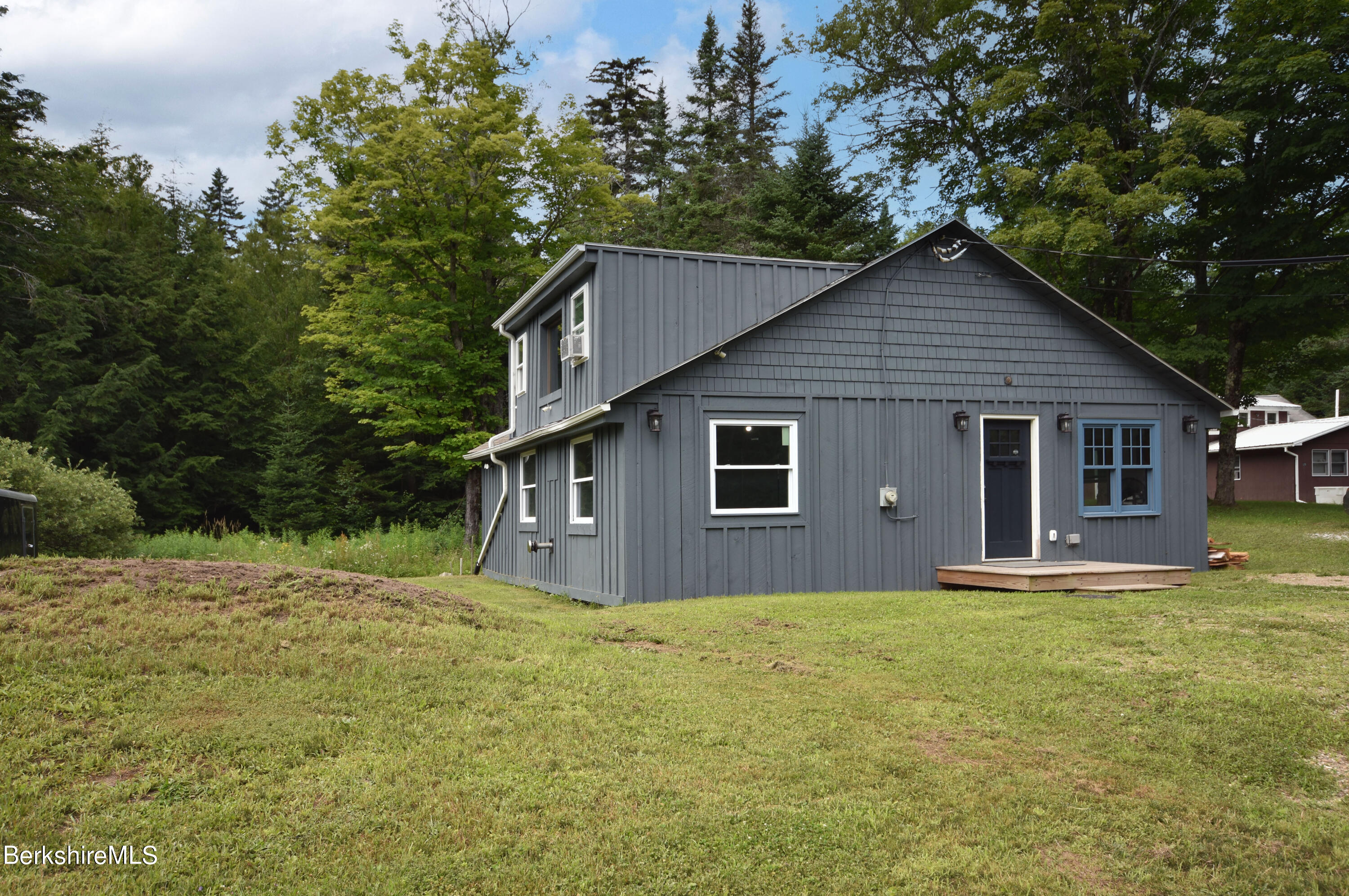 523 Center Road Savoy, MA 01256 - Photo 2 of 31 a house that has a tree in front of it