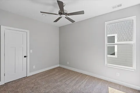 a view of a livingroom with a window