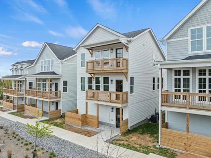 a view of a house with a big yard