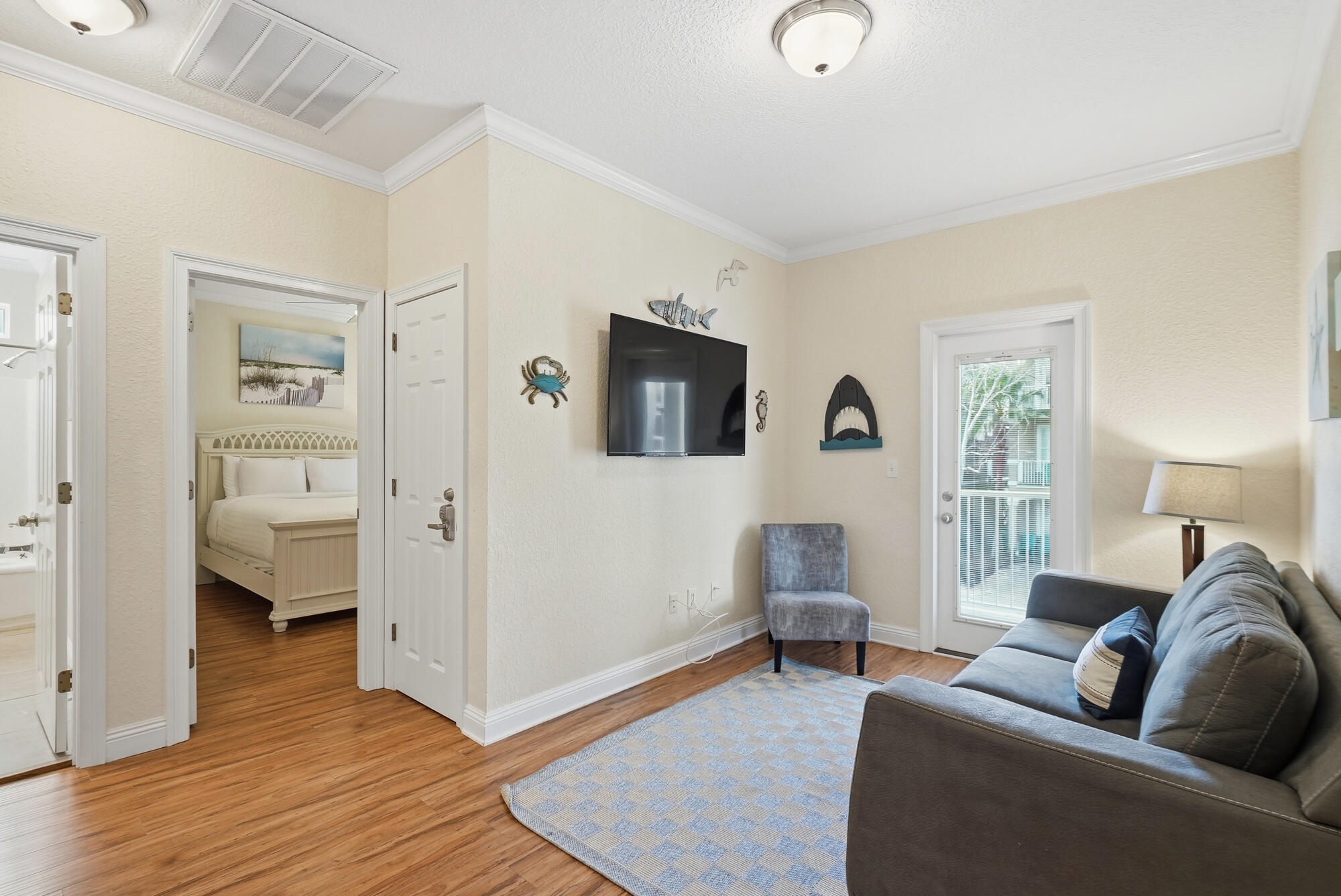 231 Kono Way Destin, FL 32541 - Photo 18 of 41 a living room with furniture and a flat screen tv