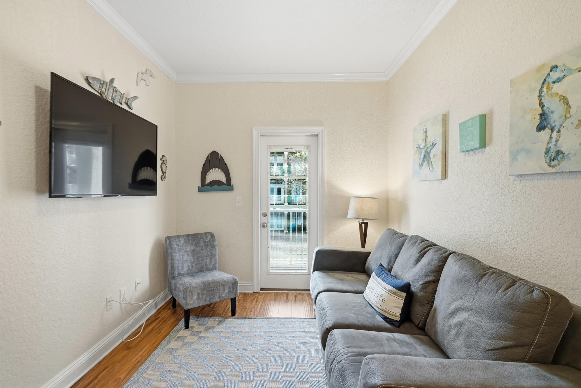 231 Kono Way Destin, FL 32541 - Photo 19 of 41 a living room with furniture and a flat screen tv