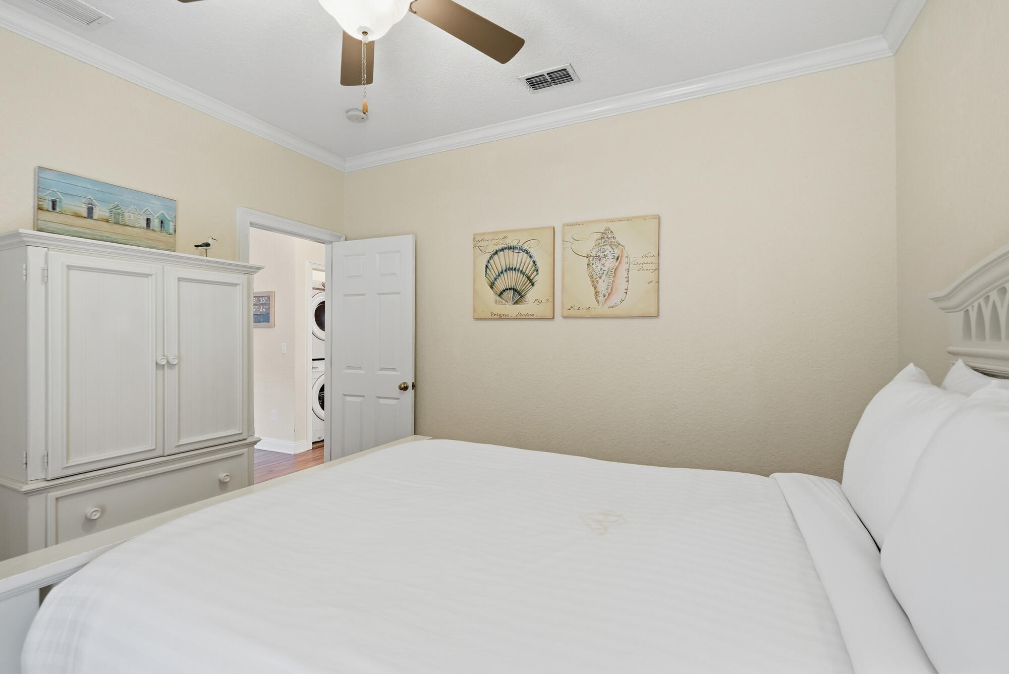 231 Kono Way Destin, FL 32541 - Photo 22 of 41 a bedroom with a bed and a window