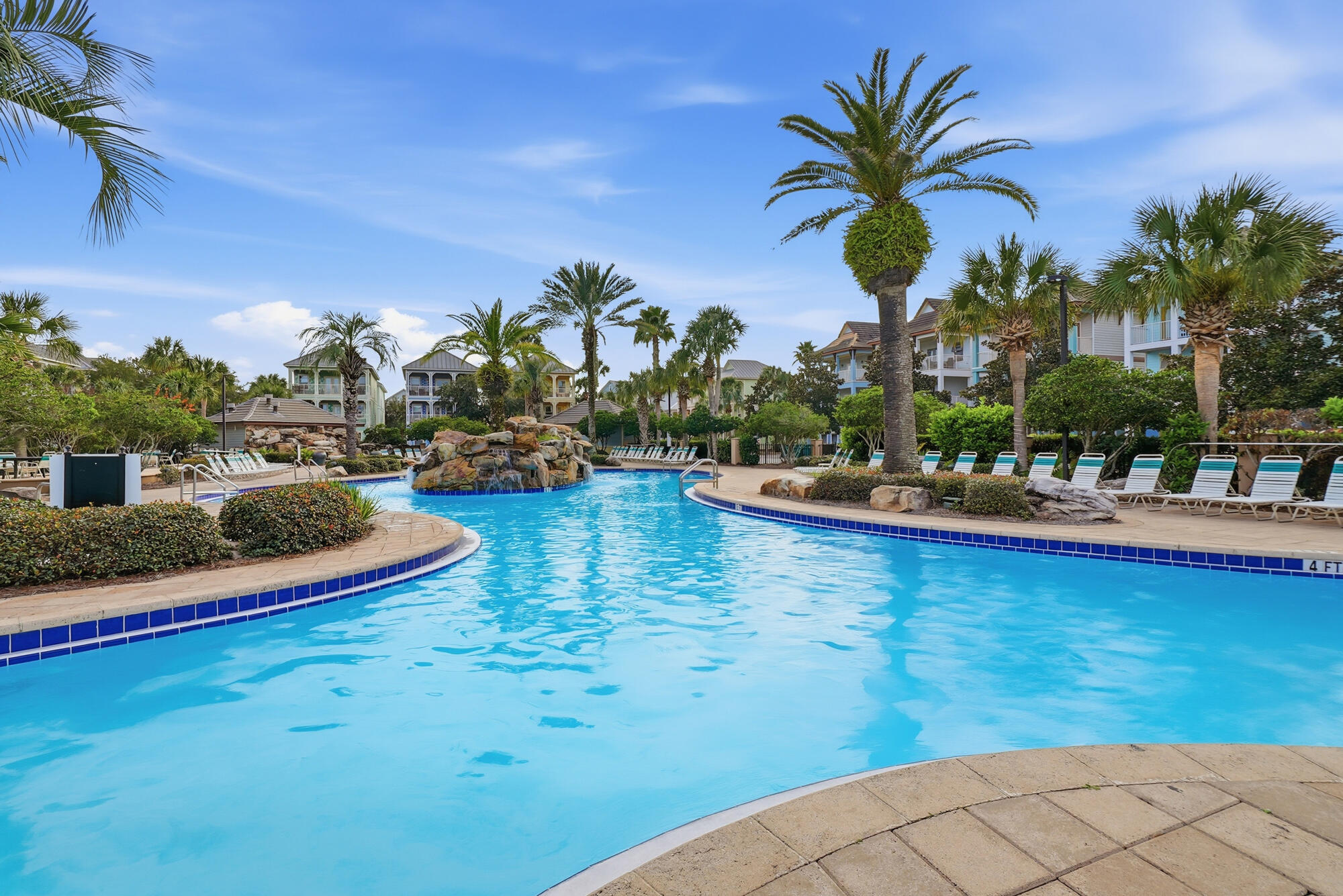231 Kono Way Destin, FL 32541 - Photo 31 of 41 a view of a swimming pool with a table and chairs