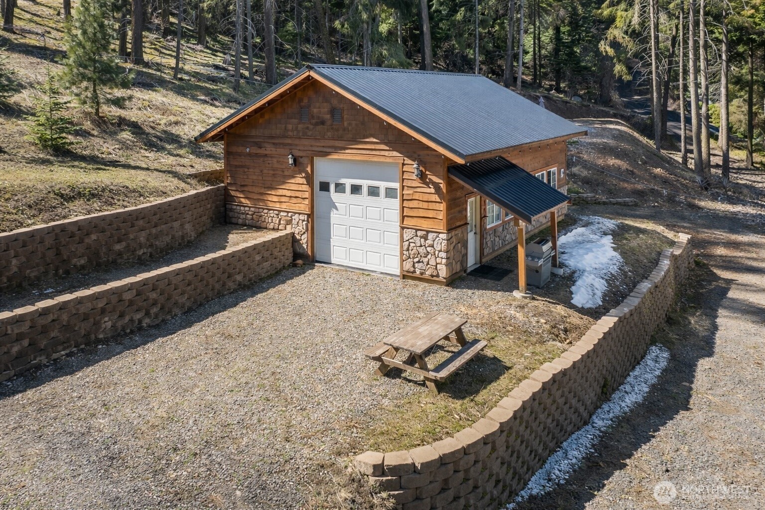 a view of a house with a yard balcony and couches