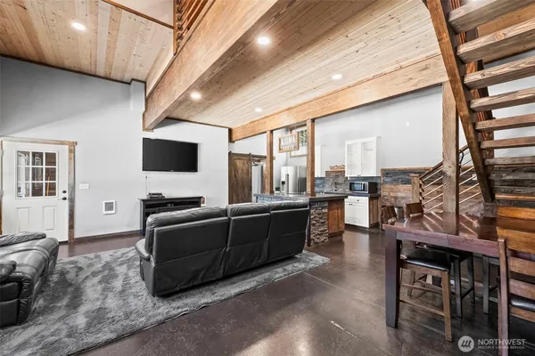 a living room with a fireplace and a window