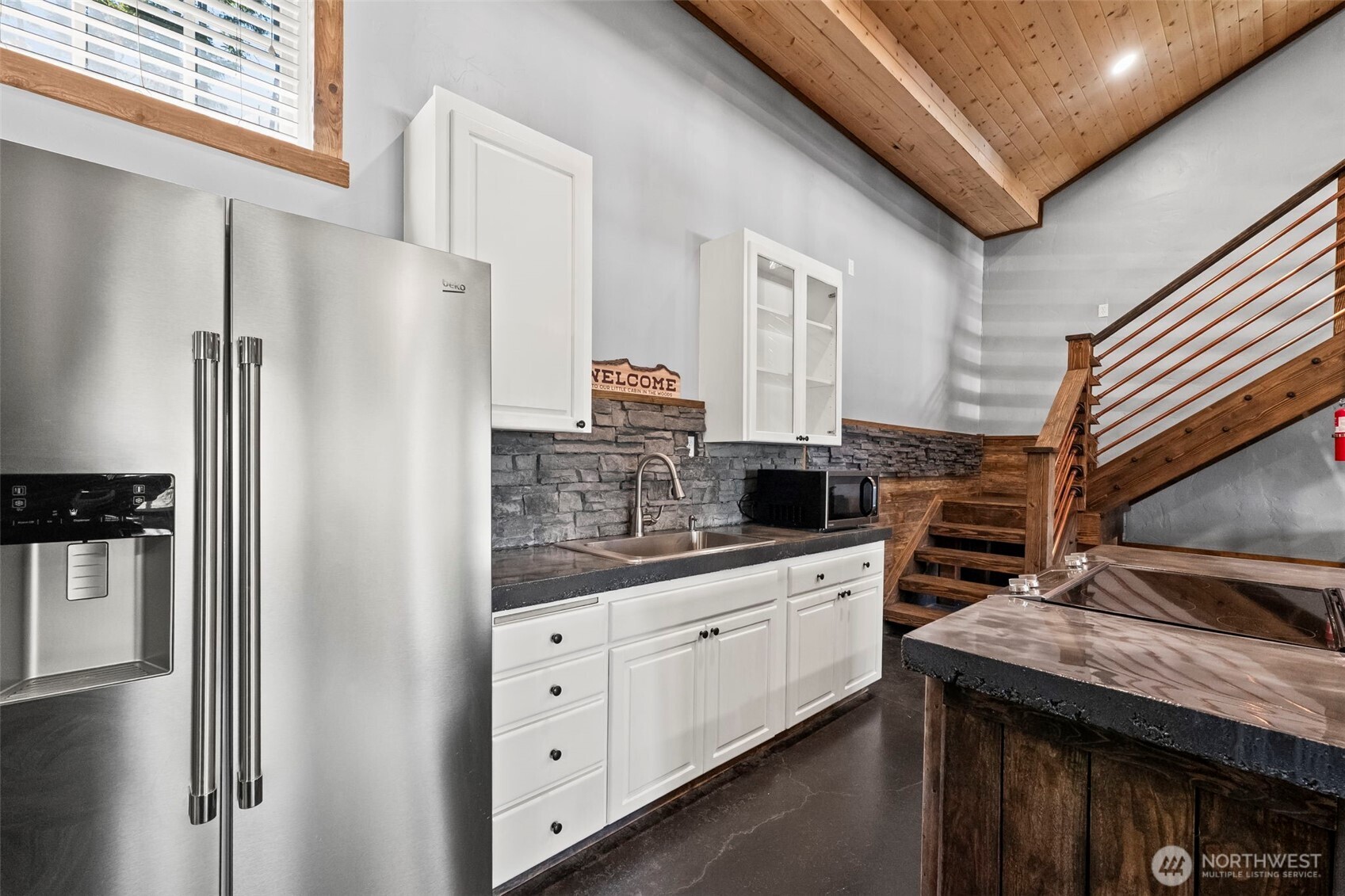 130 Horse Heaven Road Cle Elum, WA 98922 - Photo 24 of 34 a kitchen with a refrigerator and a sink