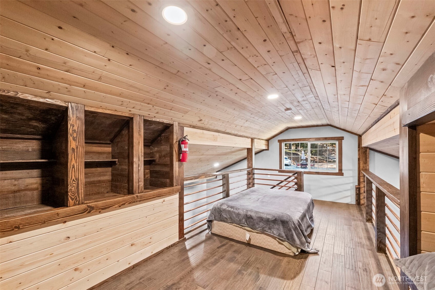 130 Horse Heaven Road Cle Elum, WA 98922 - Photo 28 of 34 a bedroom with furniture and a ceiling fan