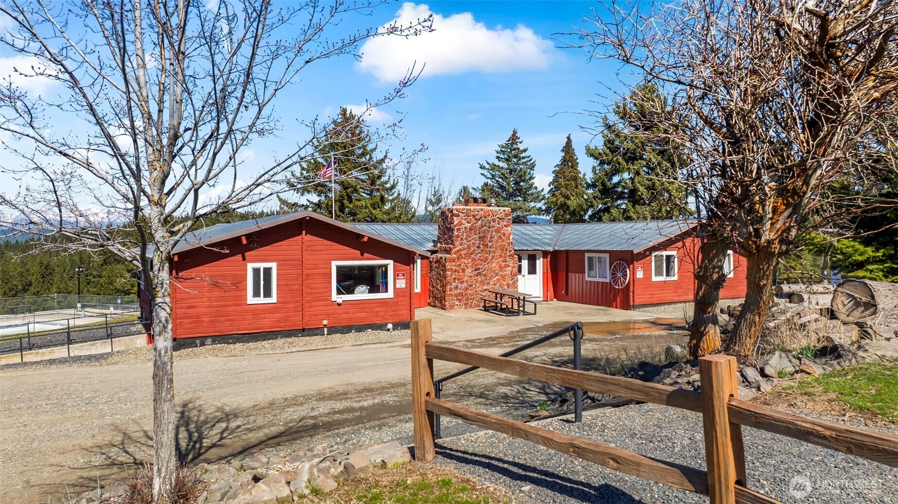 130 Horse Heaven Road Cle Elum, WA 98922 - Photo 34 of 34 a view of a house with wooden fence next to a yard