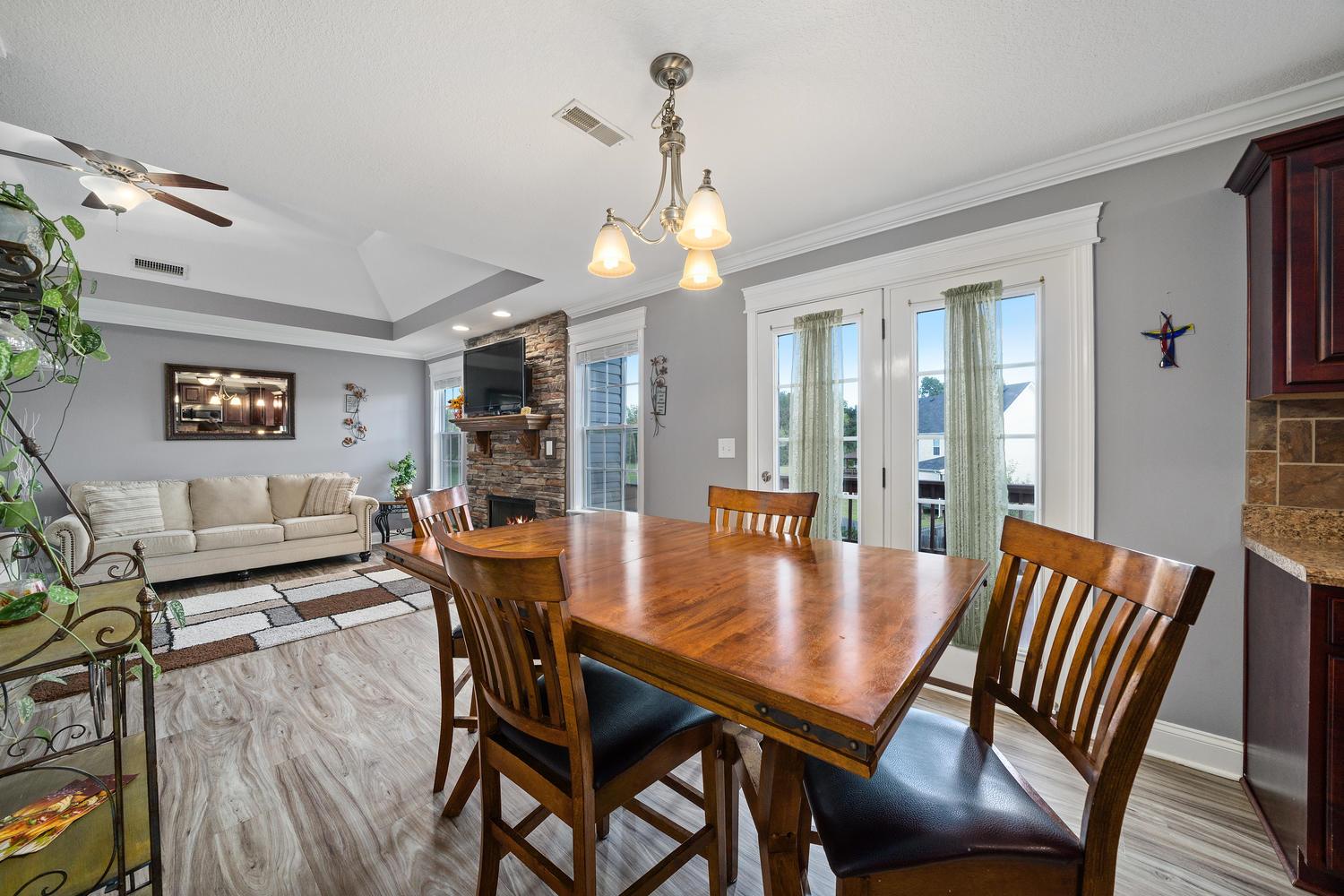 3803 Suiter Road Clarksville, TN 37040 - Photo 6 of 28 a dining room with furniture and wooden floor