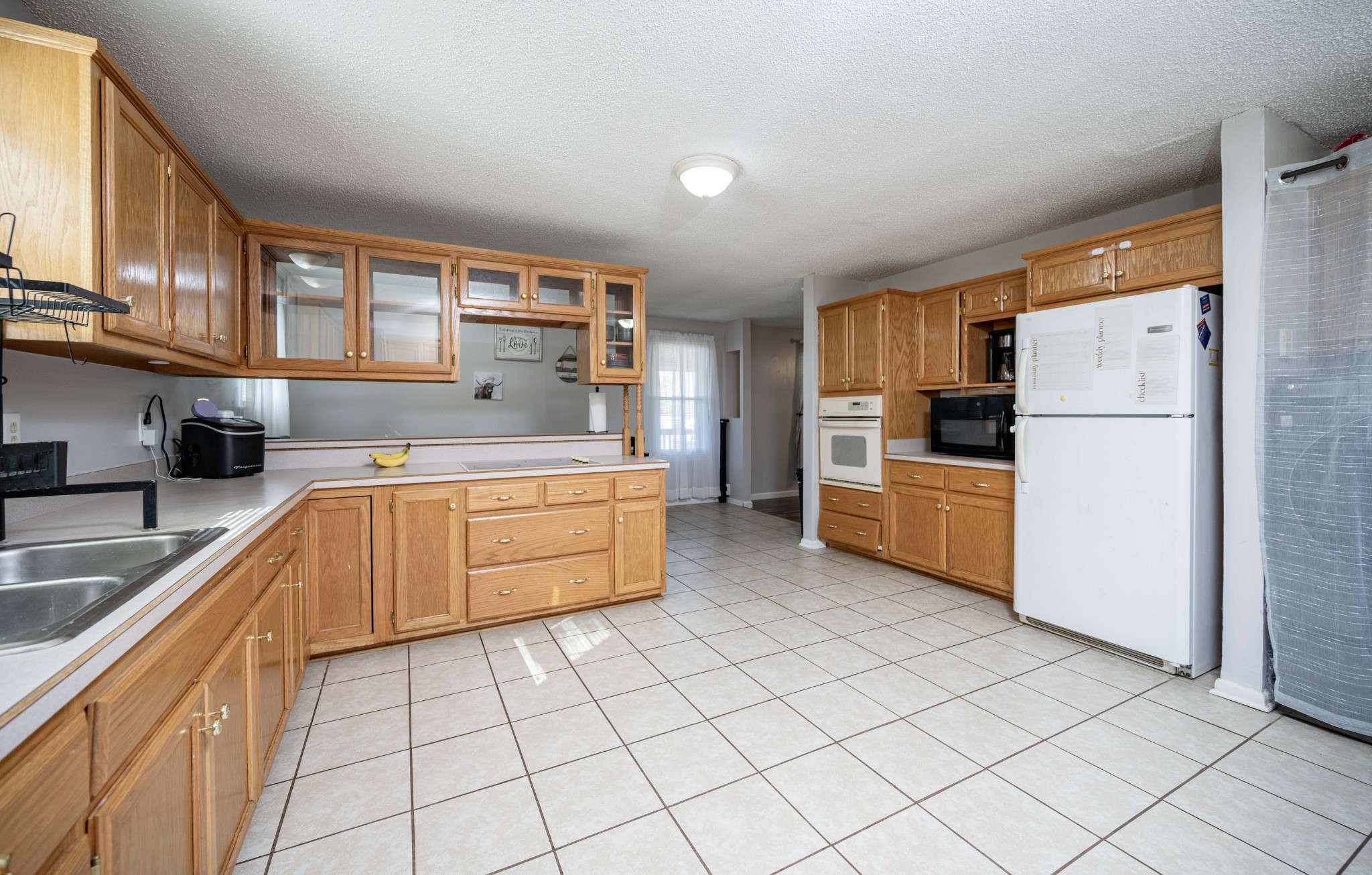 6620 Amanda Way Murfreesboro, TN 37129 - Photo 9 of 23 a kitchen with a cabinets and white appliances