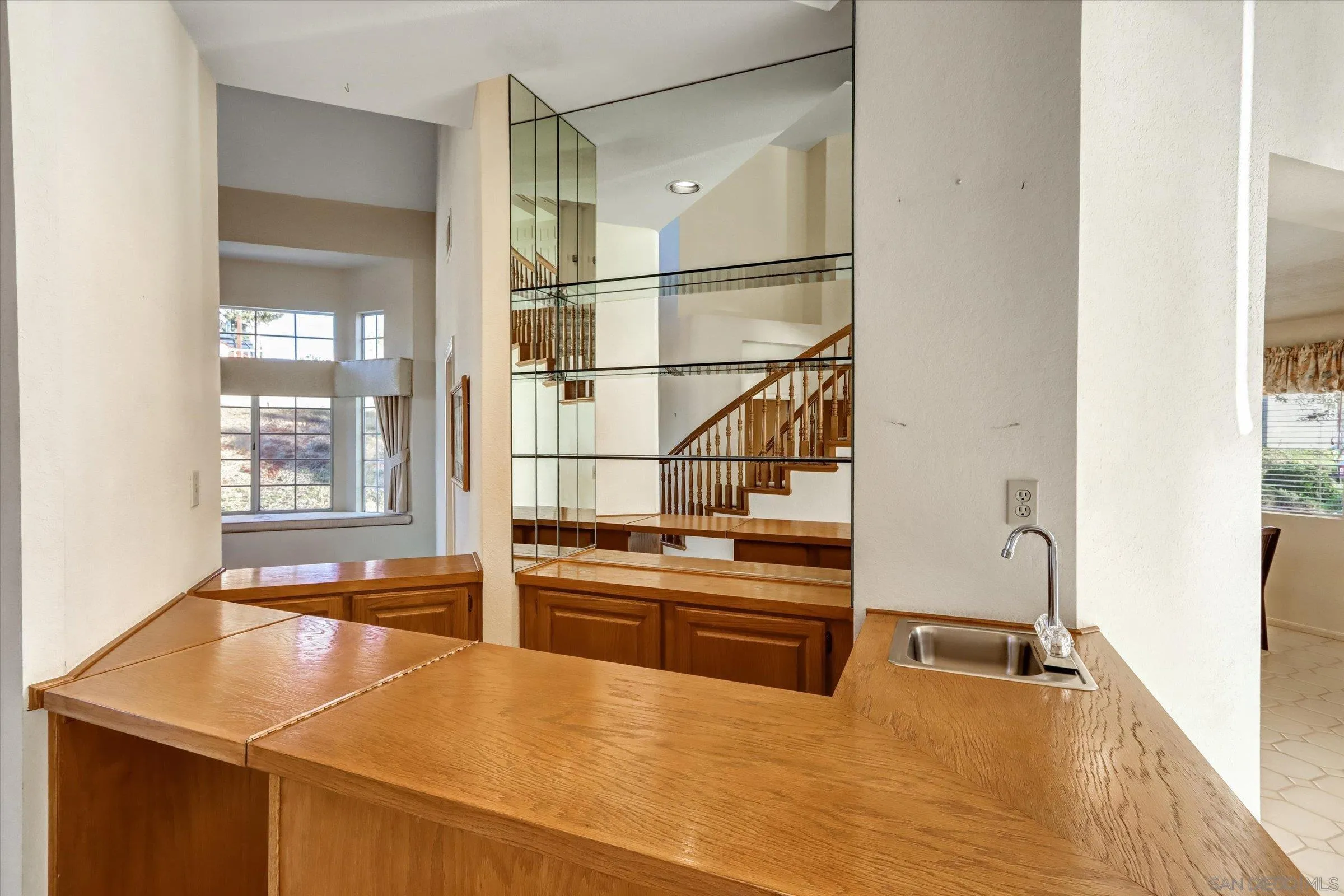 1840 Cabernet Drive Chula Vista, CA 91913 - Photo 11 of 66 a kitchen with stainless steel appliances granite countertop a sink and a refrigerator