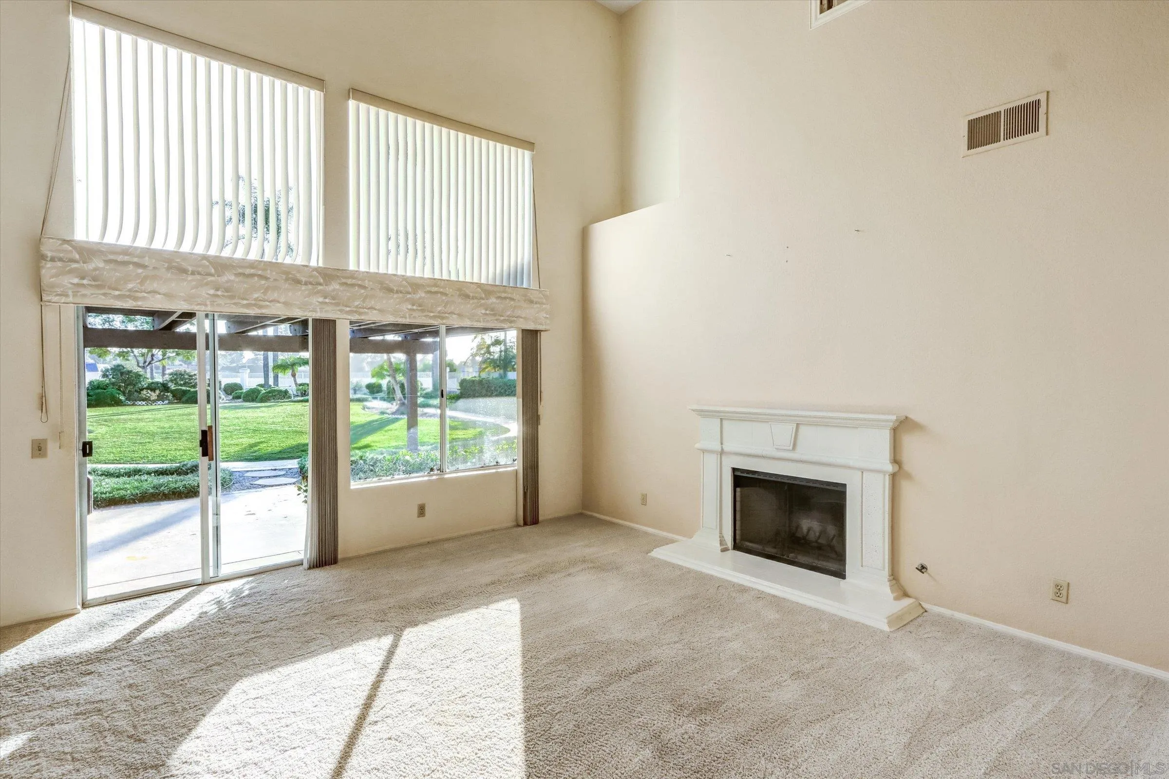 1840 Cabernet Drive Chula Vista, CA 91913 - Photo 13 of 66 an empty room with floor to ceiling window and an outdoor view