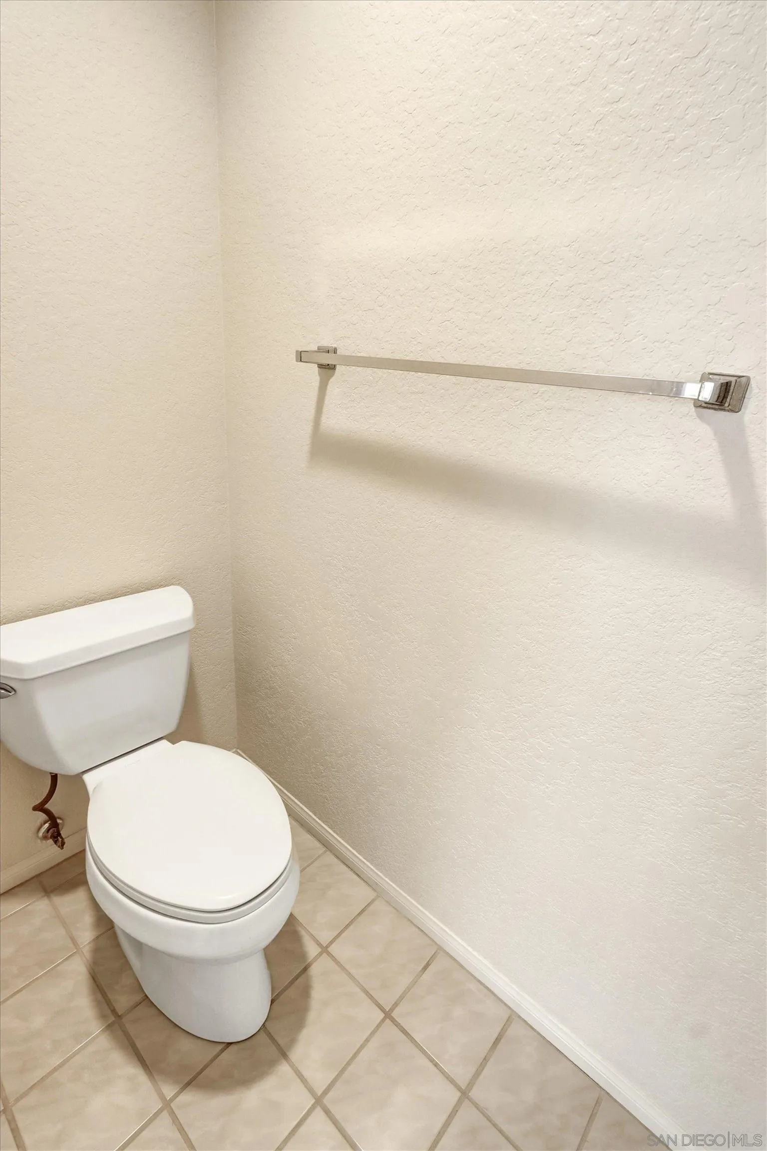 1840 Cabernet Drive Chula Vista, CA 91913 - Photo 27 of 66 a white toilet sitting next to a shower