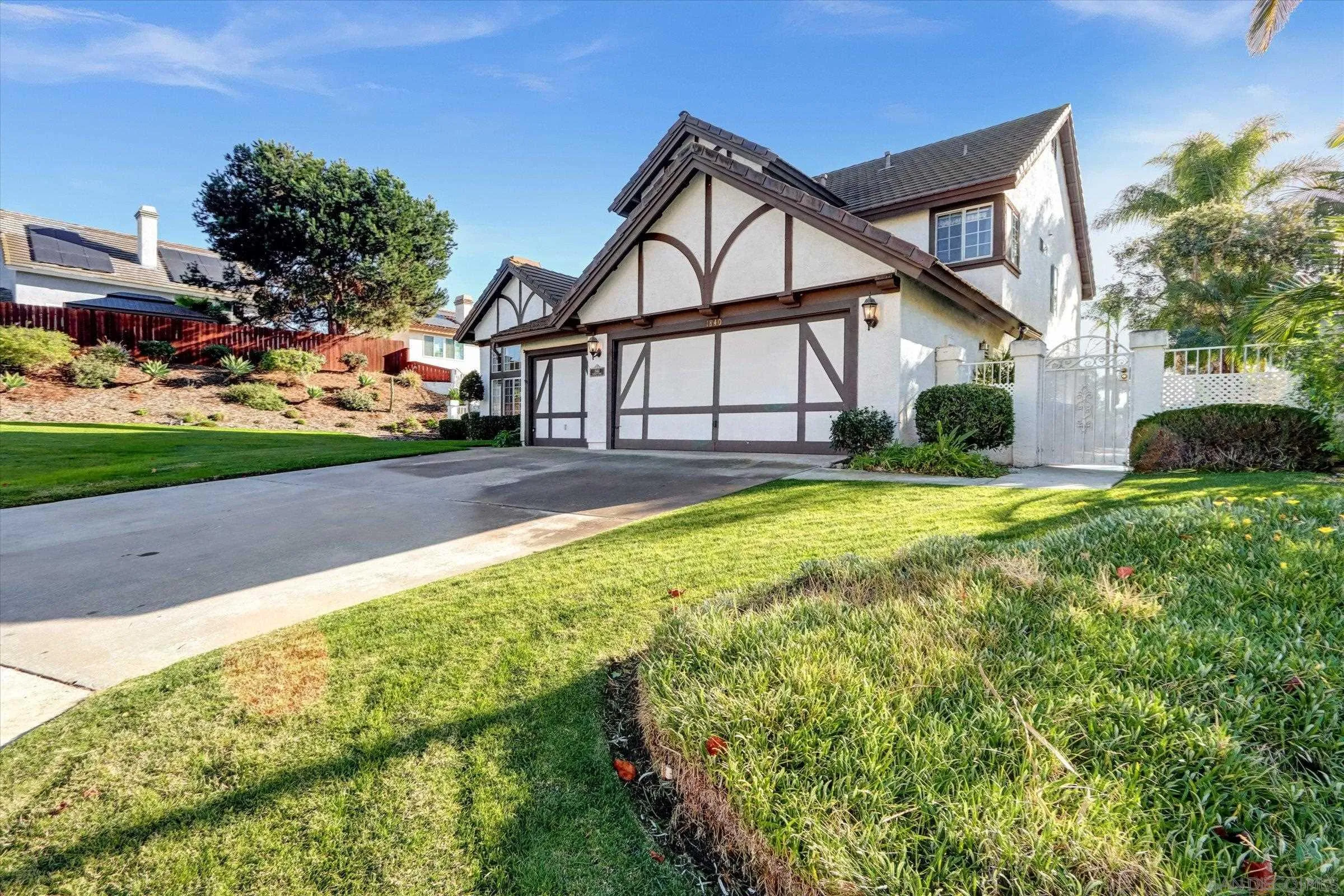 1840 Cabernet Drive Chula Vista, CA 91913 - Photo 5 of 66 a view of a house with a yard and plants