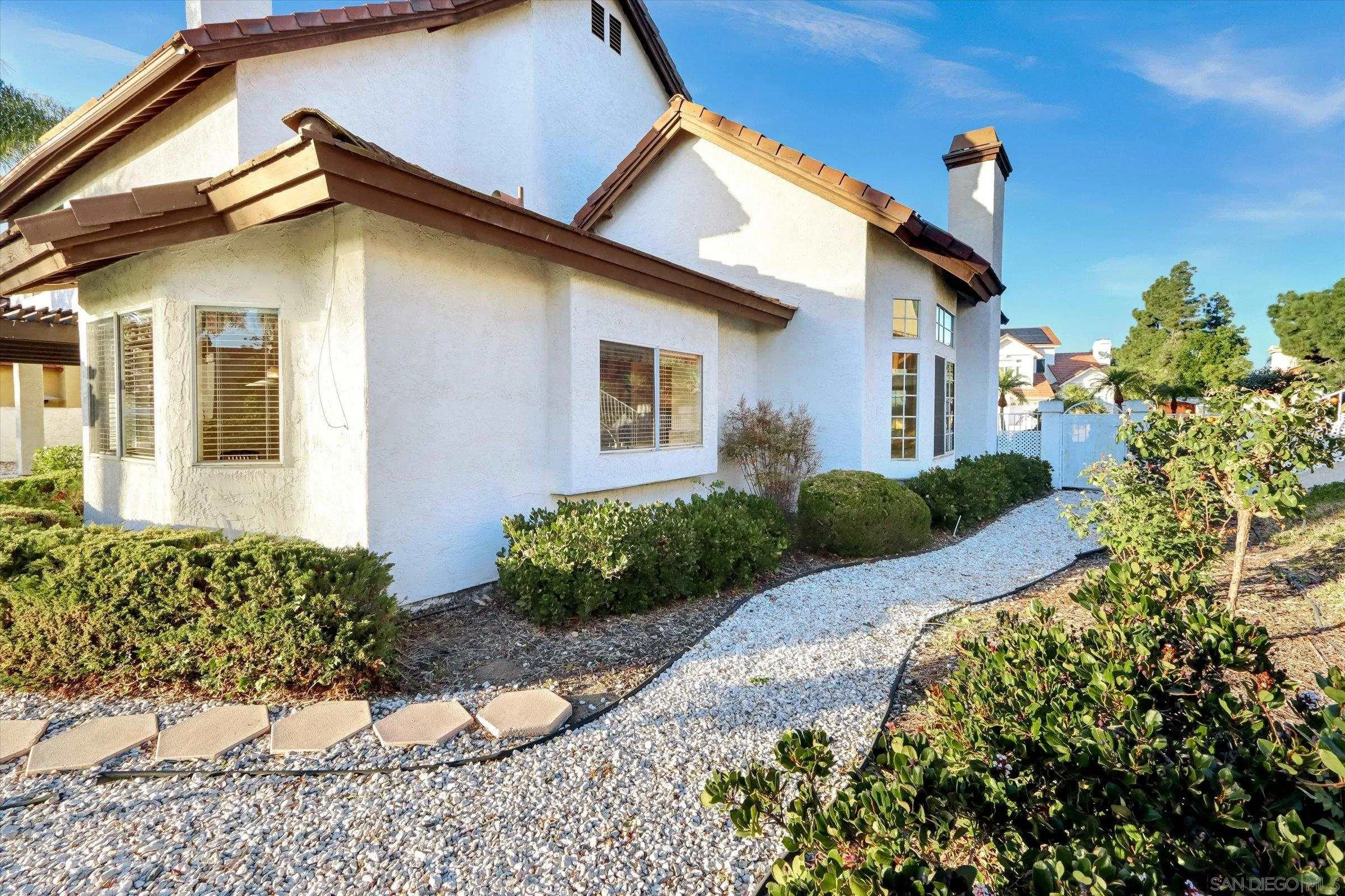 1840 Cabernet Drive Chula Vista, CA 91913 - Photo 53 of 66 a front view of a house with garden