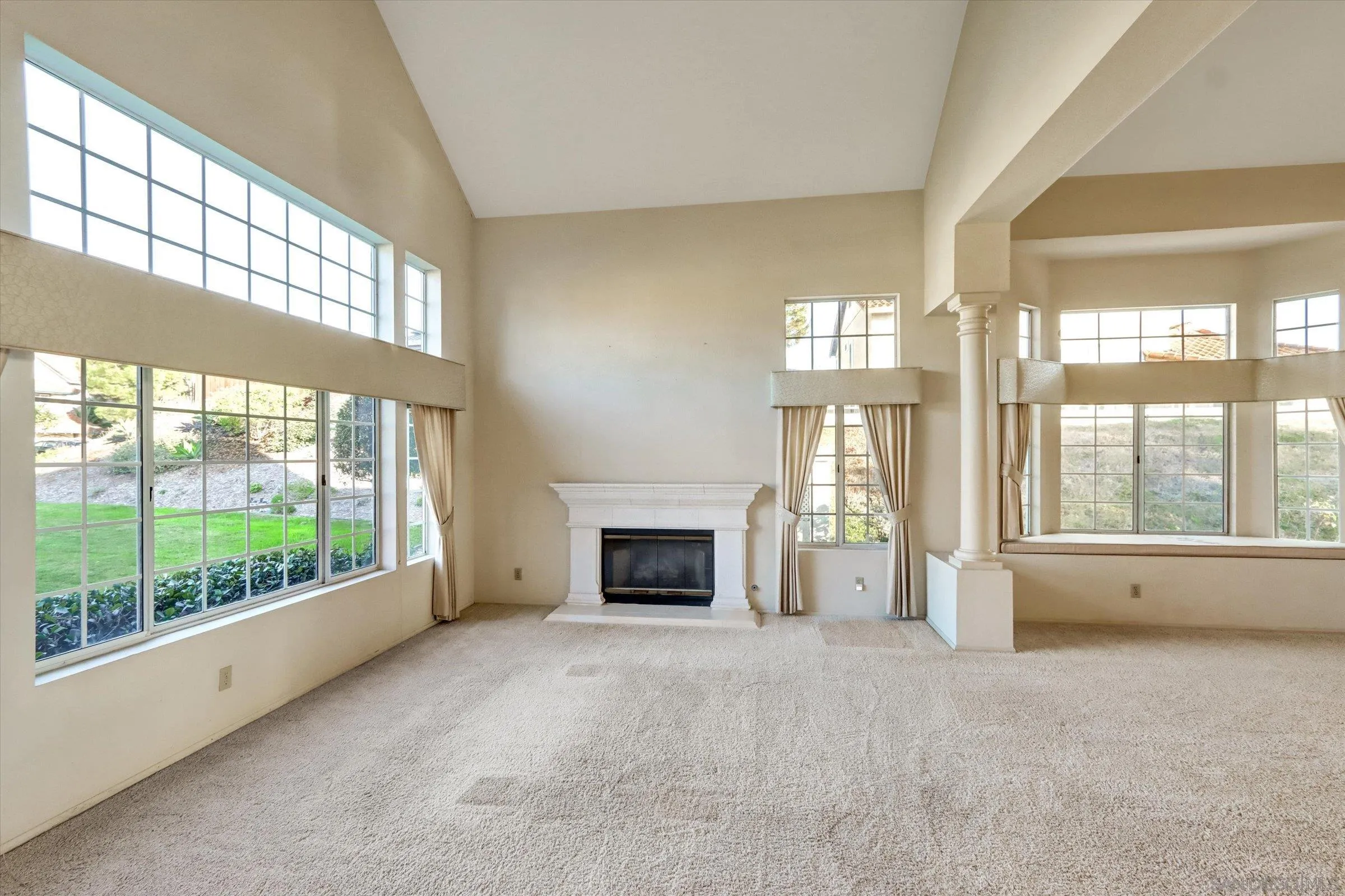 1840 Cabernet Drive Chula Vista, CA 91913 - Photo 8 of 66 wooden floor fireplace and windows in an empty room