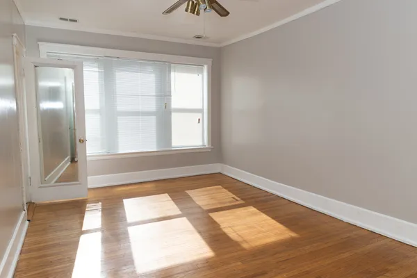 a view of an empty room and window