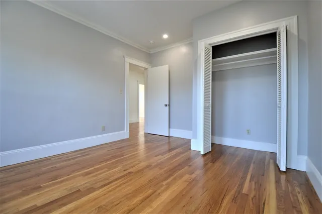a view of wooden floor in an empty room