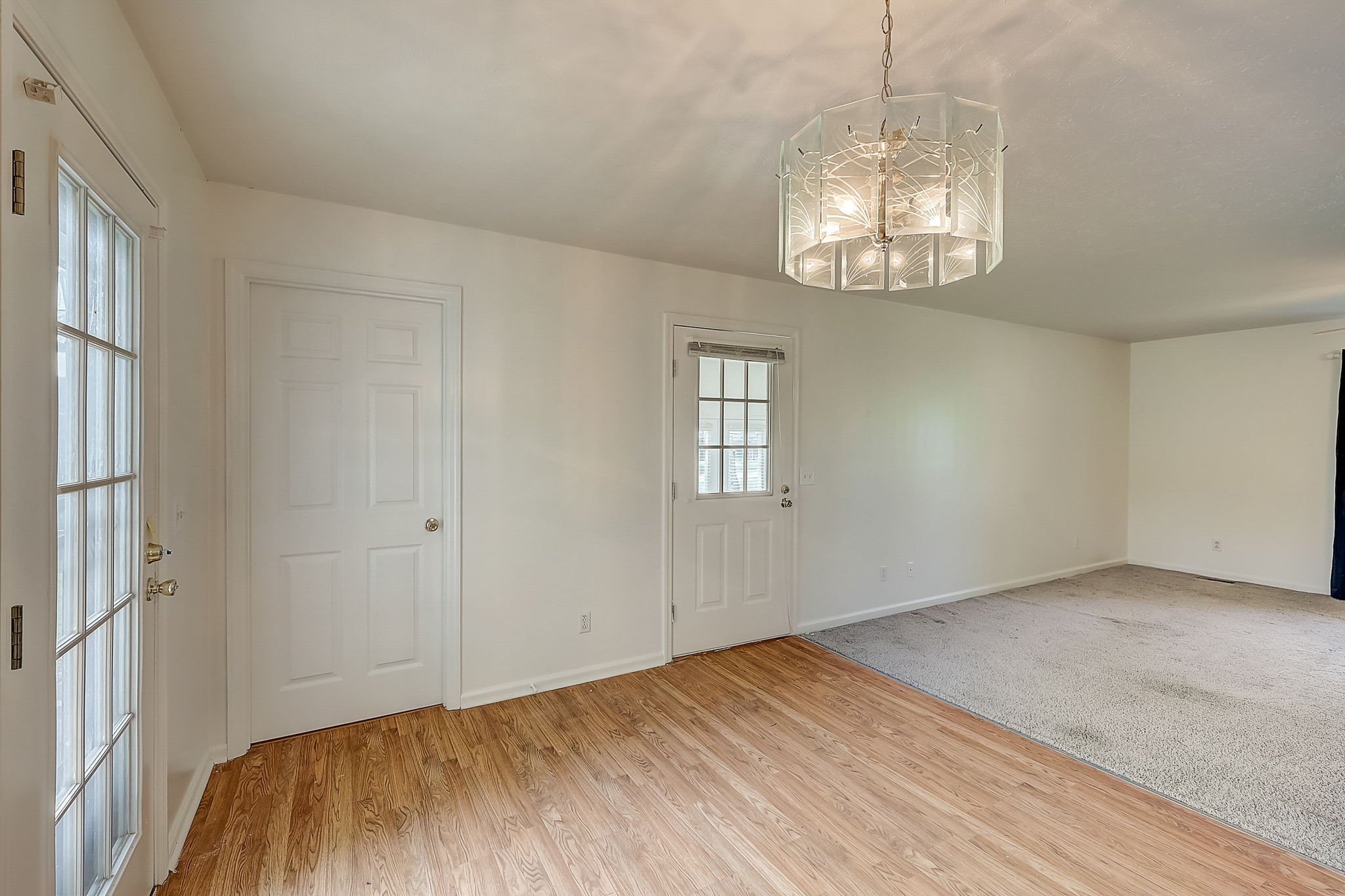 356 Howard Redmon Road Sparta, TN 38583 - Photo 15 of 68 wooden floor in an empty room with a window