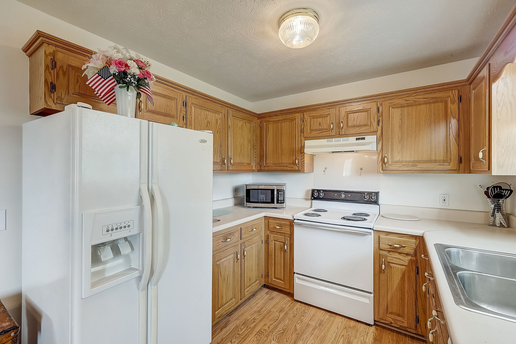 356 Howard Redmon Road Sparta, TN 38583 - Photo 18 of 68 a kitchen with stainless steel appliances a refrigerator sink and stove