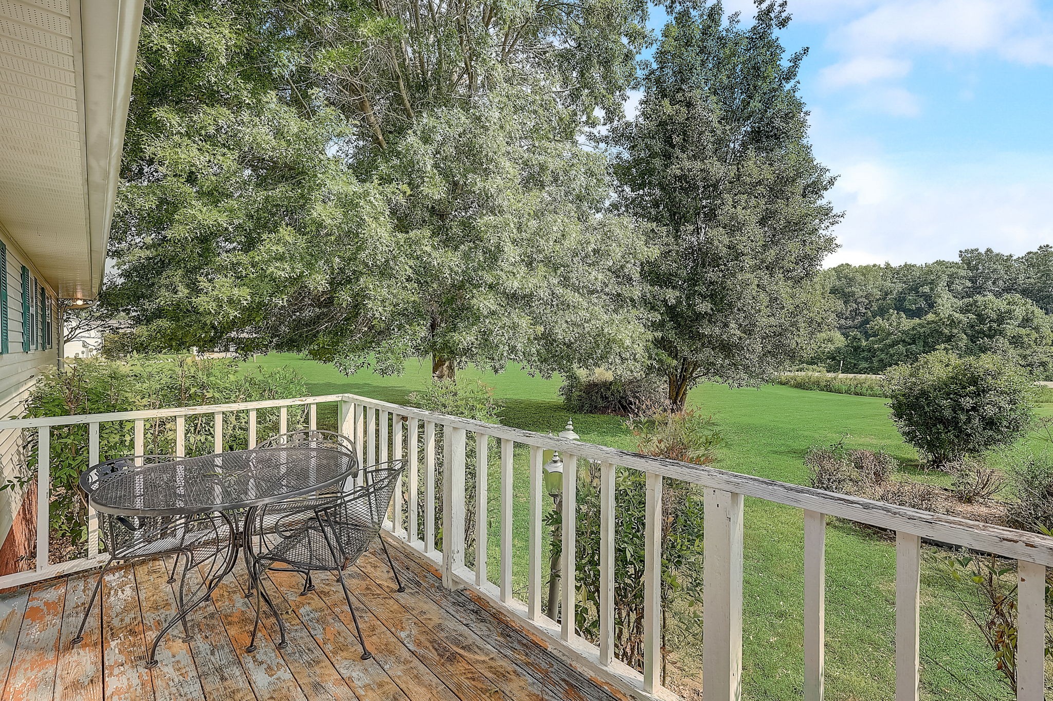 356 Howard Redmon Road Sparta, TN 38583 - Photo 38 of 68 a balcony with wooden floor and fence