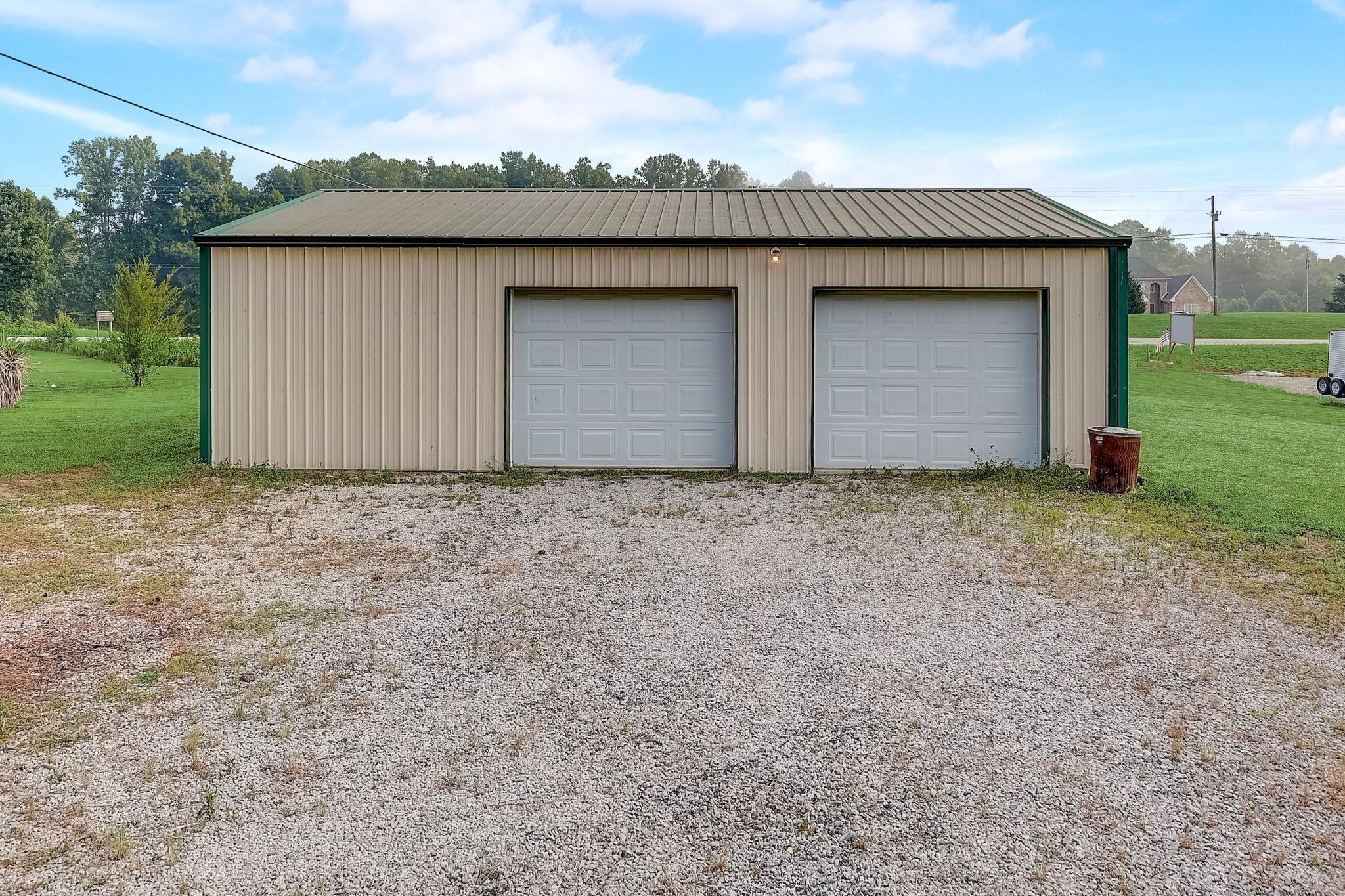 356 Howard Redmon Road Sparta, TN 38583 - Photo 55 of 68 a front view of house with garage and yard