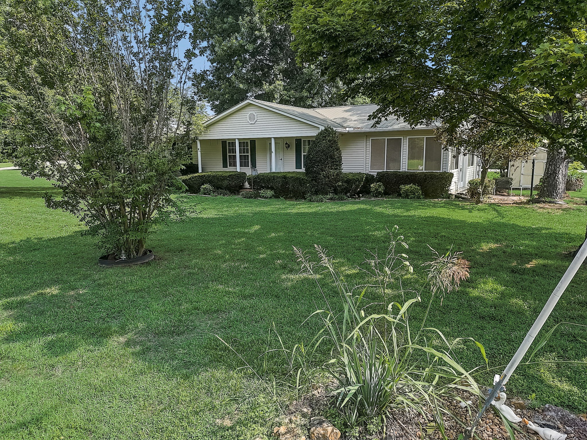 356 Howard Redmon Road Sparta, TN 38583 - Photo 57 of 68 a front view of a house with a yard