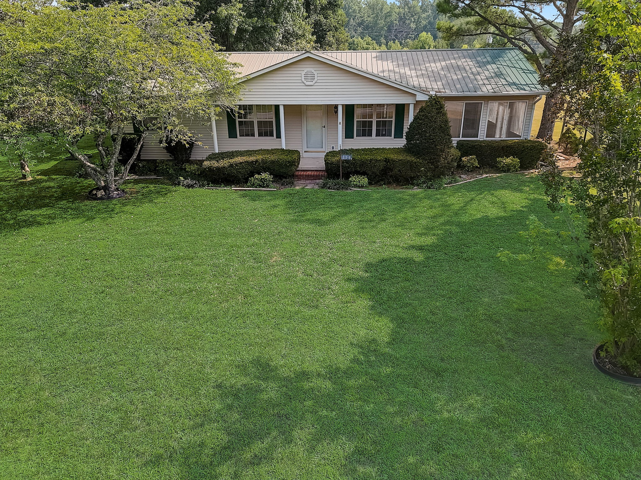 356 Howard Redmon Road Sparta, TN 38583 - Photo 61 of 68 a front view of a house with yard and green space