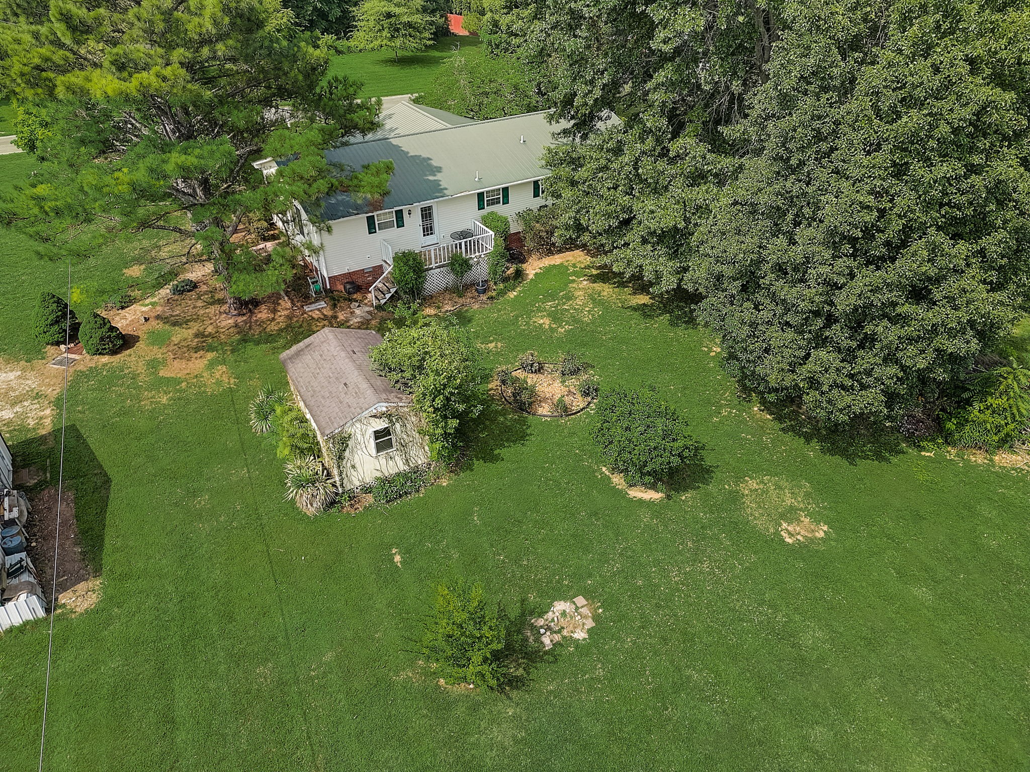 356 Howard Redmon Road Sparta, TN 38583 - Photo 66 of 68 an aerial view of a house with a yard