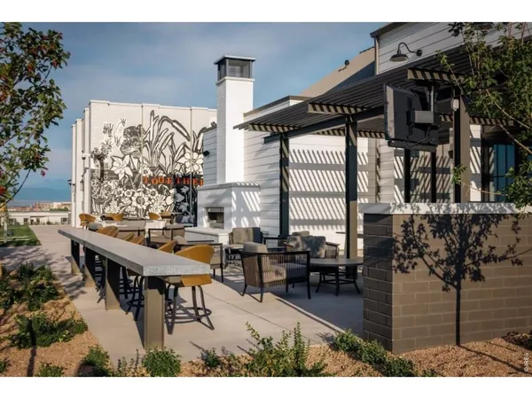 a view of a chairs and table in a patio