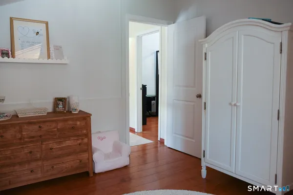 a bathroom with a toilet and a sink
