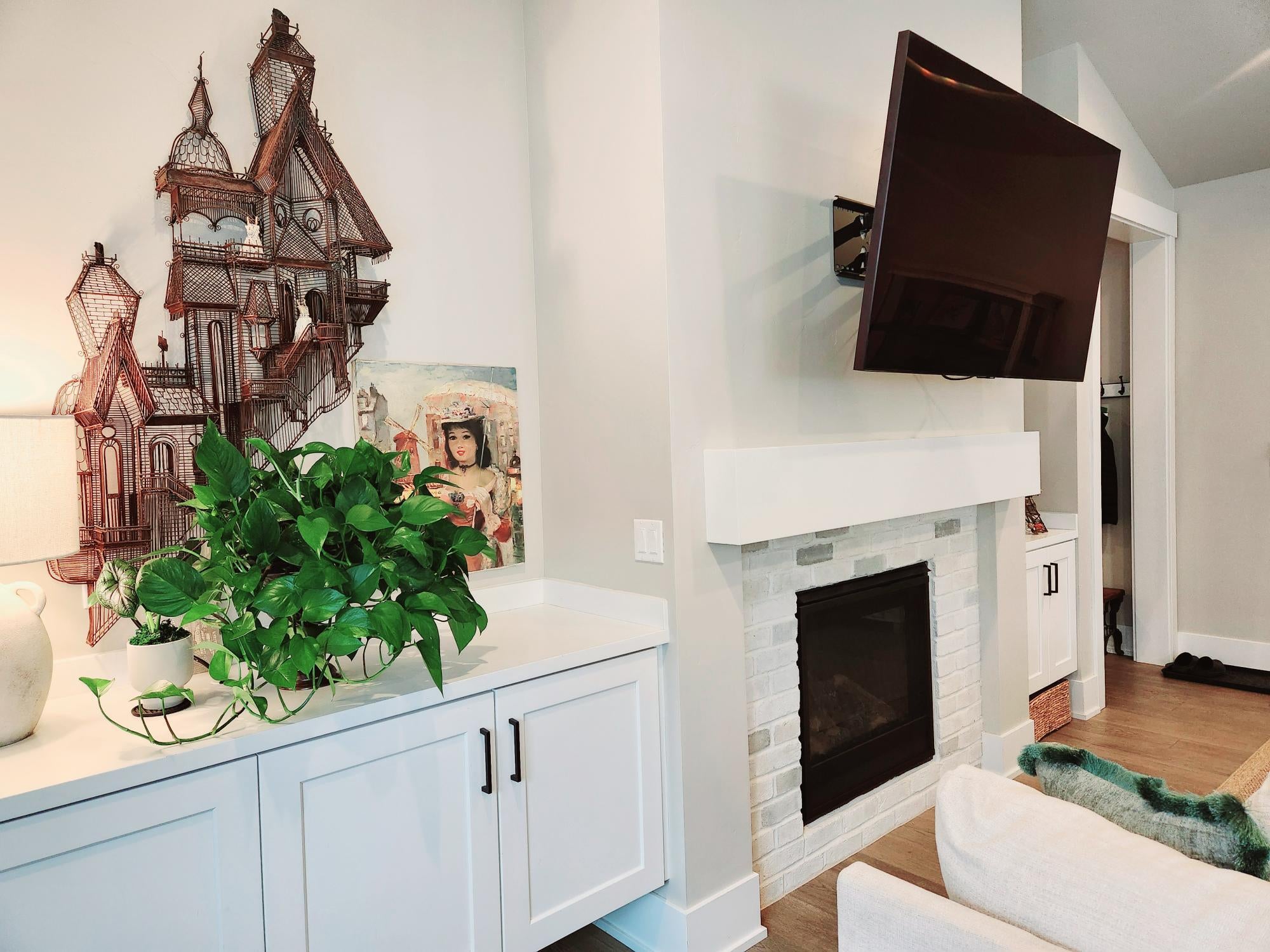 Great room has built in cabnitrey and gas fireplace.