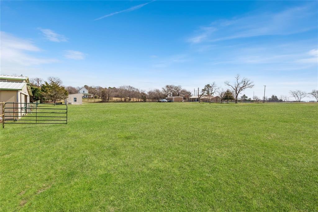 9213 Wilson Road Pilot Point, TX 76258 - Photo 36 of 36 Expansive green field offering open space