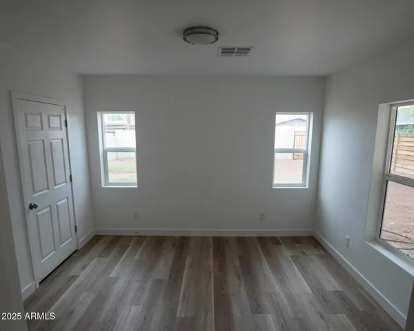 a bathroom that has a glass shower door