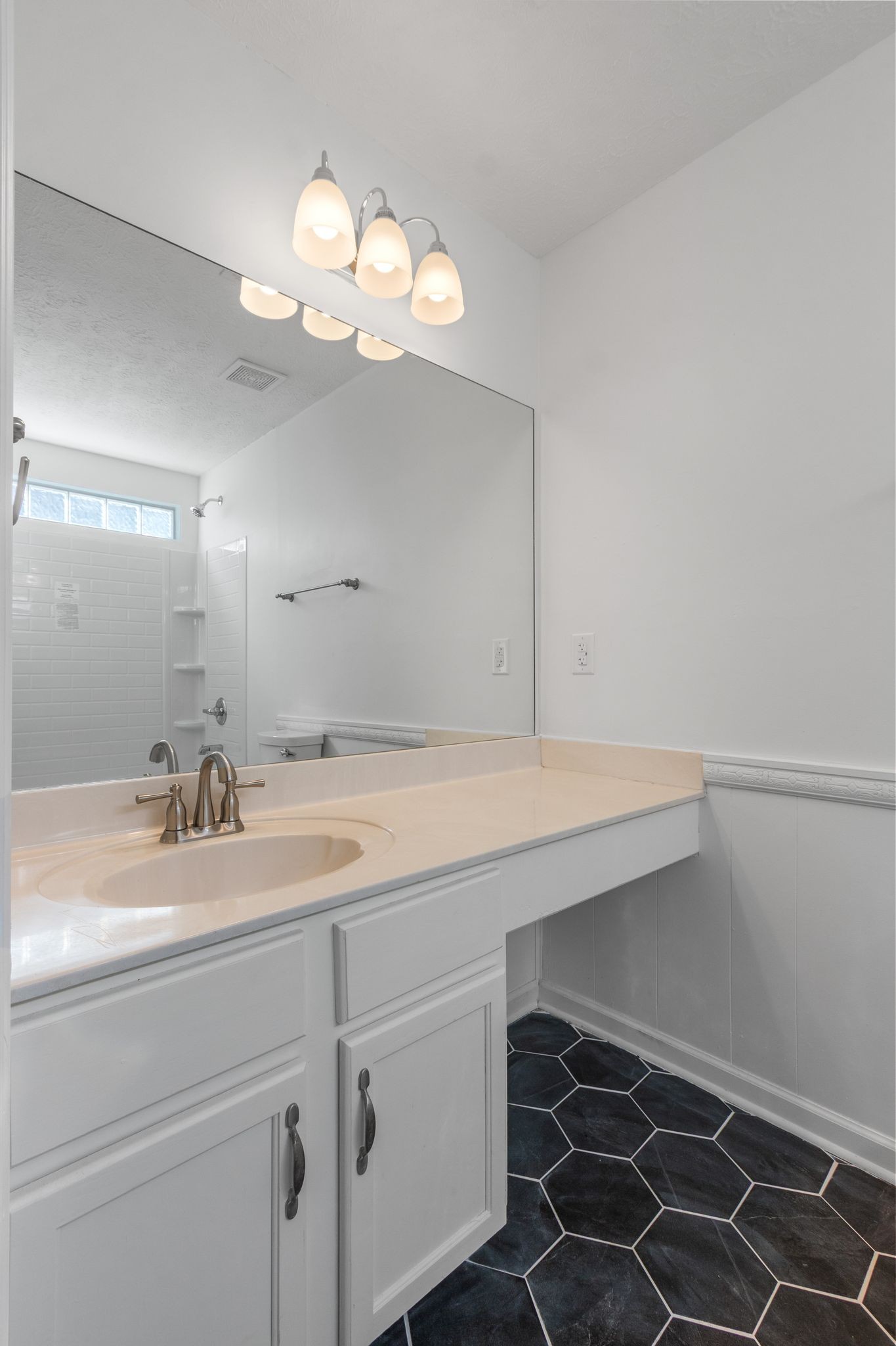 1413 Carmack Lane Spring Hill, TN 37174 - Photo 20 of 35 a bathroom with a sink and a mirror