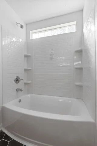 a bathroom with a bathtub