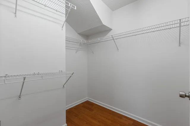 a view of a room with racks on the wall