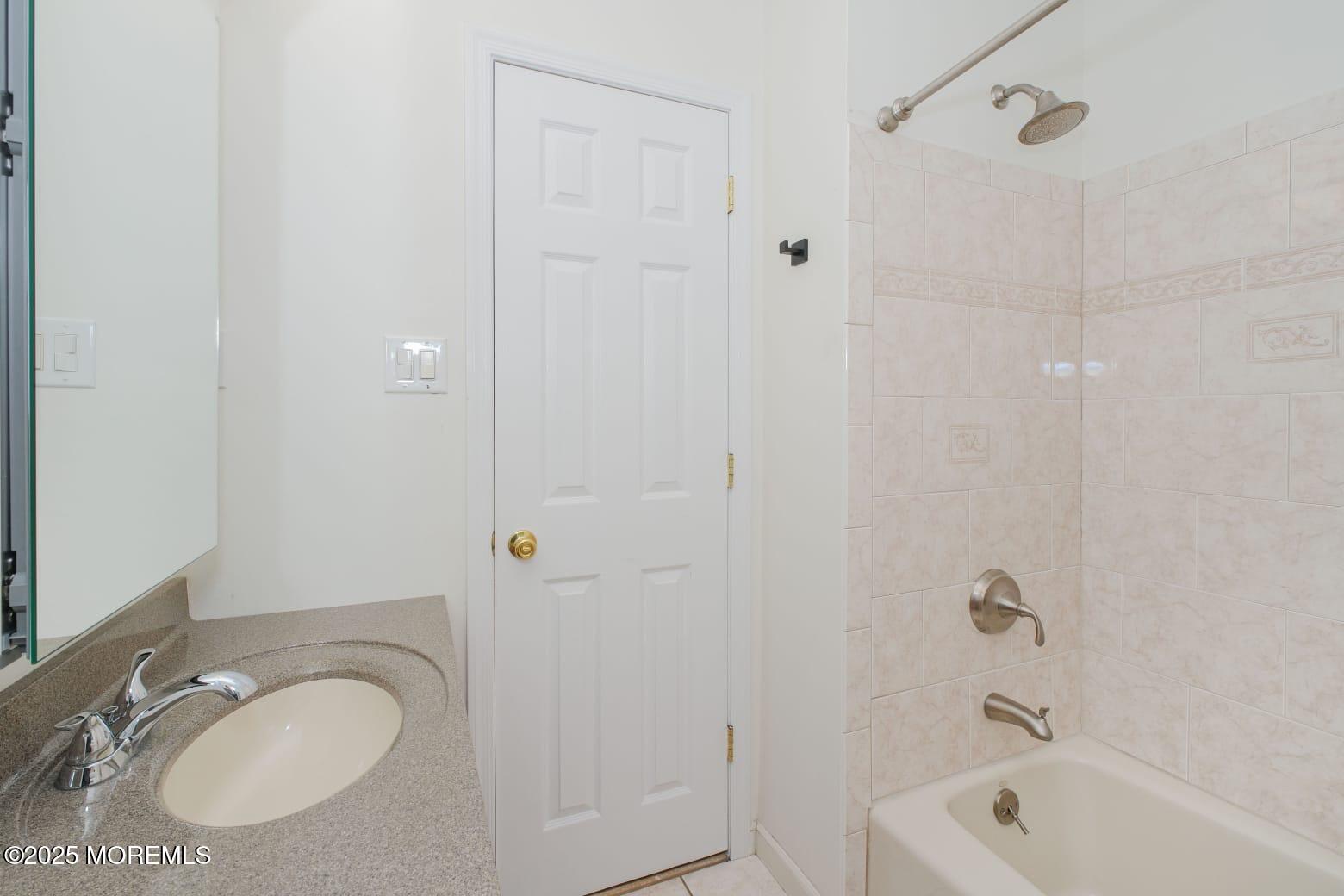 209 Woodcrest Road Oakhurst, NJ 07755 - Photo 15 of 45 a bathroom with a granite countertop sink a toilet and shower