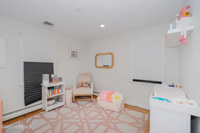 a room with furniture and a storage & utility room