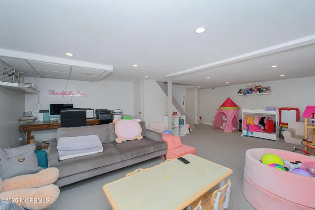 a living room with furniture and a table