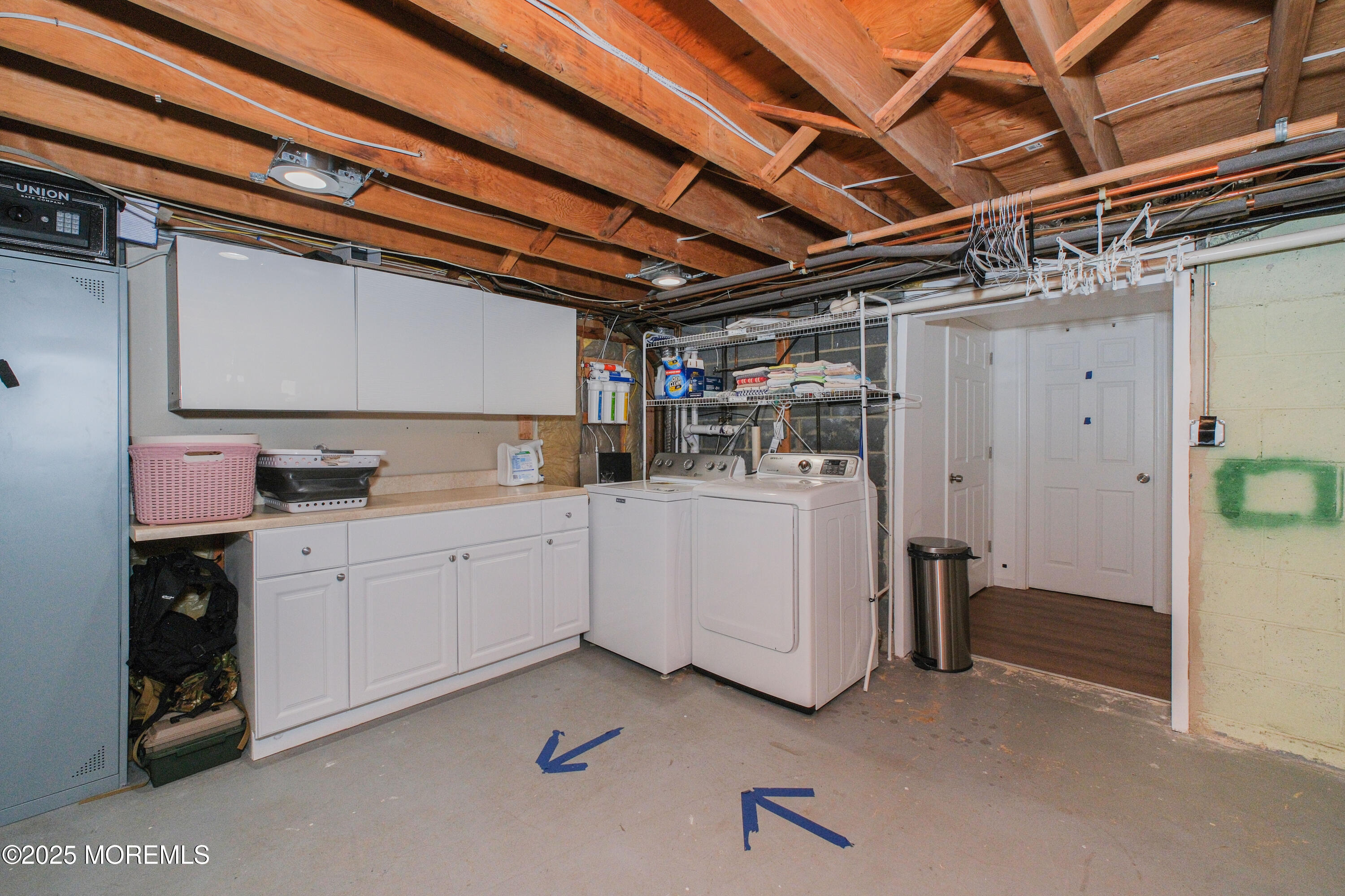 209 Woodcrest Road Oakhurst, NJ 07755 - Photo 34 of 45 a utility room with cabinets