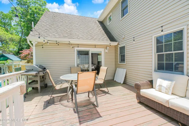 a view of a two chairs in the deck