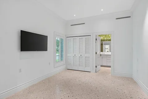 a kitchen with stainless steel appliances granite countertop a sink and a stove
